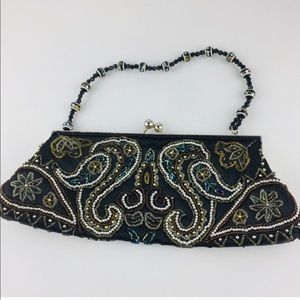 Clutch purse black with silver beating bea…
